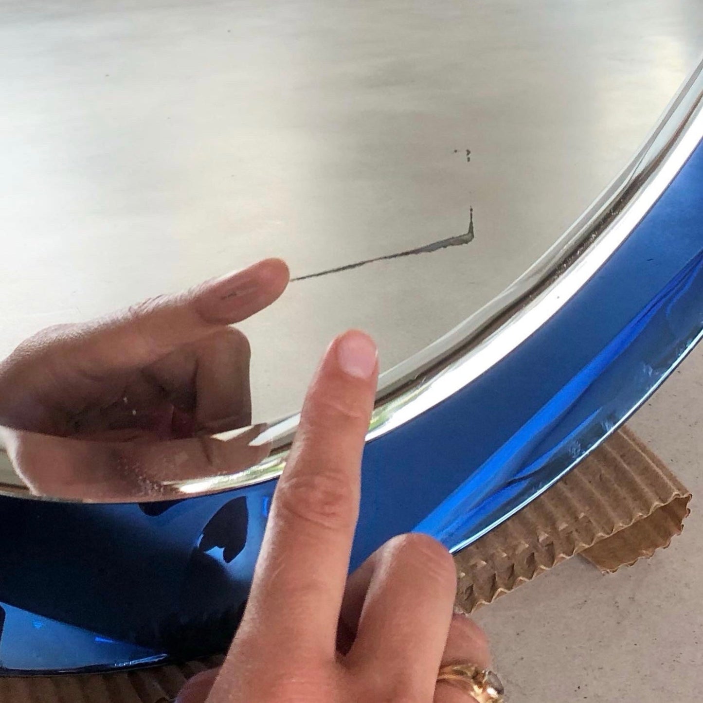 Vintage mirror with cobalt blue glass frame